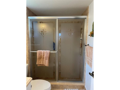 Welcome home to this spacious, remodeled unit in the highly on Sunrise Lakes Phase IV Golf Course in Florida - for sale on GolfHomes.com, golf home, golf lot