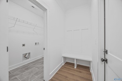 This beautifully crafted residence features an open floor plan on Canebrake Golf Club in AL - for sale on GolfHomes.com, golf home, golf lot