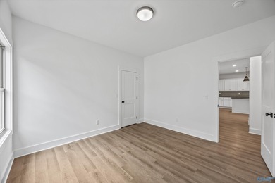 This beautifully crafted residence features an open floor plan on Canebrake Golf Club in AL - for sale on GolfHomes.com, golf home, golf lot