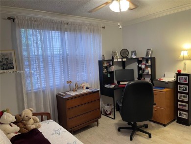 Welcome home to this spacious, remodeled unit in the highly on Sunrise Lakes Phase IV Golf Course in Florida - for sale on GolfHomes.com, golf home, golf lot