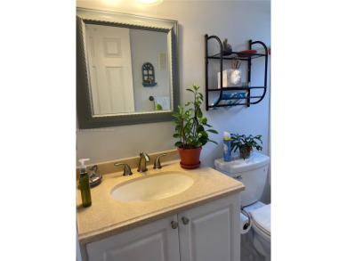 Welcome home to this spacious, remodeled unit in the highly on Sunrise Lakes Phase IV Golf Course in Florida - for sale on GolfHomes.com, golf home, golf lot