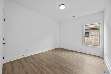 This beautifully crafted residence features an open floor plan on Canebrake Golf Club in AL - for sale on GolfHomes.com, golf home, golf lot