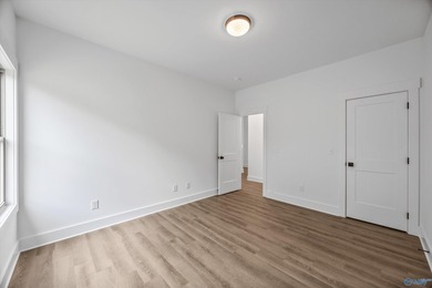 This beautifully crafted residence features an open floor plan on Canebrake Golf Club in AL - for sale on GolfHomes.com, golf home, golf lot