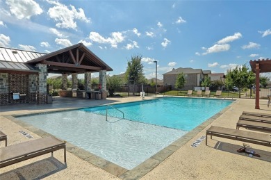 Welcome to this impeccably designed 4-bedroom, 3.5-bathroom home on Frisco Lakes Golf Course in Texas - for sale on GolfHomes.com, golf home, golf lot