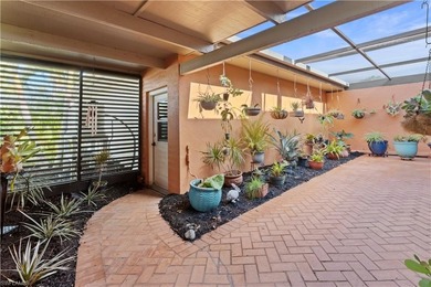Unexpected and full of wonder, this refined 3-bedroom plus den on The Forest Country Club in Florida - for sale on GolfHomes.com, golf home, golf lot