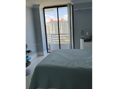 Spectacular water views from Every room in this 2 bed/2 bath on Turnberry Isle Resort and Club in Florida - for sale on GolfHomes.com, golf home, golf lot