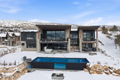 Experience elevated mountain living in this premier view estate on Red Ledges Golf Club in Utah - for sale on GolfHomes.com, golf home, golf lot