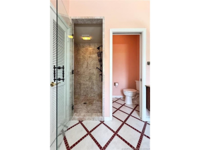 Discover this beautifully maintained 5-bedroom 3.5-bath CBS home on Martin Downs Country Club in Florida - for sale on GolfHomes.com, golf home, golf lot