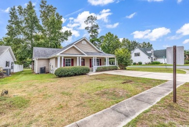 Located just a stone's throw from the beach, this charming home on Tupelo Bay Golf Complex  in South Carolina - for sale on GolfHomes.com, golf home, golf lot