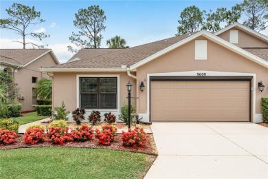 TIMBER GREENS - BEAUTIFULLY REMODELED along the 17th fairway on Timber Greens Country Club in Florida - for sale on GolfHomes.com, golf home, golf lot