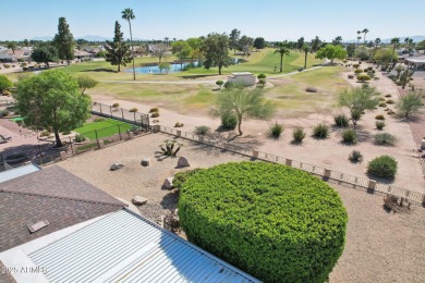 Welcome to this beautiful spacious home nestled between holes 4 on Sun City-Willow Creek / Willow Brook  in Arizona - for sale on GolfHomes.com, golf home, golf lot