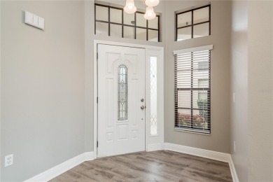TIMBER GREENS - BEAUTIFULLY REMODELED along the 17th fairway on Timber Greens Country Club in Florida - for sale on GolfHomes.com, golf home, golf lot