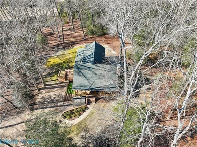 Entering into 322 Fairfield, you are engulfed in warmth. This on Piankatank River Golf Club in Virginia - for sale on GolfHomes.com, golf home, golf lot