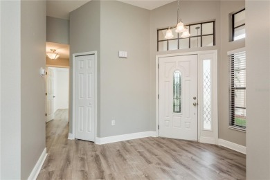 TIMBER GREENS - BEAUTIFULLY REMODELED along the 17th fairway on Timber Greens Country Club in Florida - for sale on GolfHomes.com, golf home, golf lot