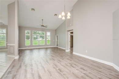 TIMBER GREENS - BEAUTIFULLY REMODELED along the 17th fairway on Timber Greens Country Club in Florida - for sale on GolfHomes.com, golf home, golf lot