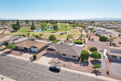 Welcome to this beautiful spacious home nestled between holes 4 on Sun City-Willow Creek / Willow Brook  in Arizona - for sale on GolfHomes.com, golf home, golf lot