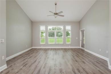 TIMBER GREENS - BEAUTIFULLY REMODELED along the 17th fairway on Timber Greens Country Club in Florida - for sale on GolfHomes.com, golf home, golf lot