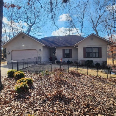 Beautiful, Must-See, Golf Course home, overlooking the green of on Cherokee Village South Course in Arkansas - for sale on GolfHomes.com, golf home, golf lot