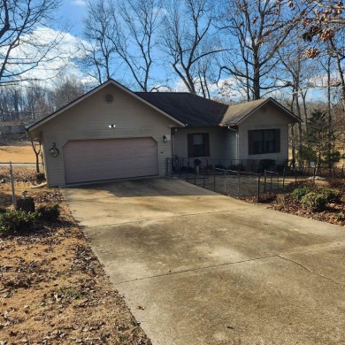 Beautiful, Must-See, Golf Course home, overlooking the green of on Cherokee Village South Course in Arkansas - for sale on GolfHomes.com, golf home, golf lot