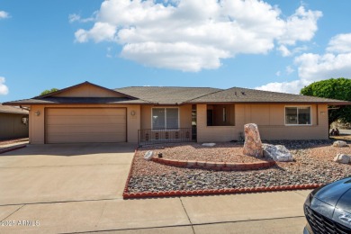 Welcome to this beautiful spacious home nestled between holes 4 on Sun City-Willow Creek / Willow Brook  in Arizona - for sale on GolfHomes.com, golf home, golf lot