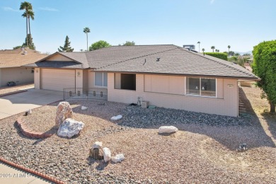 Welcome to this beautiful spacious home nestled between holes 4 on Sun City-Willow Creek / Willow Brook  in Arizona - for sale on GolfHomes.com, golf home, golf lot