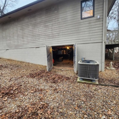 Beautiful, Must-See, Golf Course home, overlooking the green of on Cherokee Village South Course in Arkansas - for sale on GolfHomes.com, golf home, golf lot