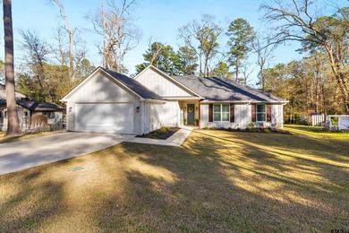 This inviting home welcomes you the moment you step through the on Hide-A-Way Lake Golf Course in Texas - for sale on GolfHomes.com, golf home, golf lot
