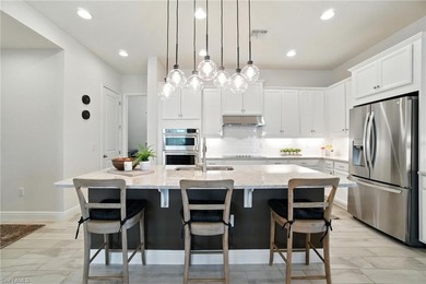 Modern, move-in ready, and effortlessly fresh, this on Vanderbilt Country Club in Florida - for sale on GolfHomes.com, golf home, golf lot