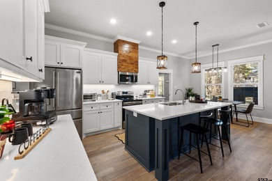 This inviting home welcomes you the moment you step through the on Hide-A-Way Lake Golf Course in Texas - for sale on GolfHomes.com, golf home, golf lot