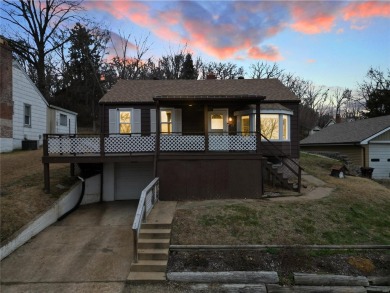 This lovingly maintained 3-bedroom, 1-bathroom bungalow offers a on Riverside Golf Club - Riverside in Missouri - for sale on GolfHomes.com, golf home, golf lot