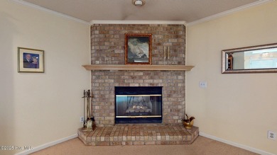 Welcome to this charming and spacious one-story home situated on on Whispering Pines Golf Course in North Carolina - for sale on GolfHomes.com, golf home, golf lot