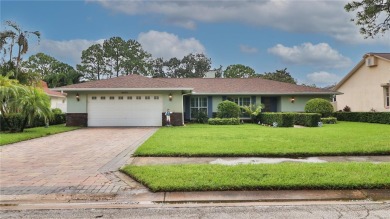 Imagine yourself living in this beautiful pool home in the heart on Bayou Golf Club in Florida - for sale on GolfHomes.com, golf home, golf lot