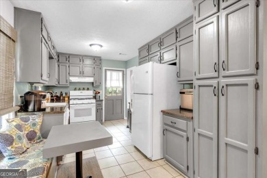 Discover this charming 3-bedroom, 2-bath ranch-style home on Fairfield Plantation Golf and Country Club in Georgia - for sale on GolfHomes.com, golf home, golf lot