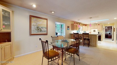 Welcome to this charming and spacious one-story home situated on on Whispering Pines Golf Course in North Carolina - for sale on GolfHomes.com, golf home, golf lot