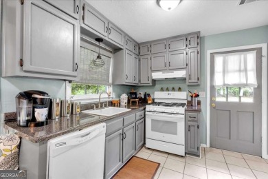 Discover this charming 3-bedroom, 2-bath ranch-style home on Fairfield Plantation Golf and Country Club in Georgia - for sale on GolfHomes.com, golf home, golf lot