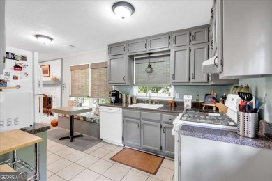 Discover this charming 3-bedroom, 2-bath ranch-style home on Fairfield Plantation Golf and Country Club in Georgia - for sale on GolfHomes.com, golf home, golf lot
