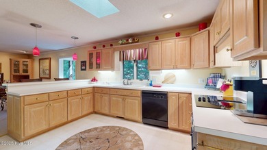 Welcome to this charming and spacious one-story home situated on on Whispering Pines Golf Course in North Carolina - for sale on GolfHomes.com, golf home, golf lot