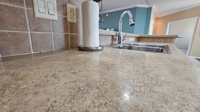 Located in the premier Riverside Club - Golf and Marina on The Riverside Golf Club in Florida - for sale on GolfHomes.com, golf home, golf lot