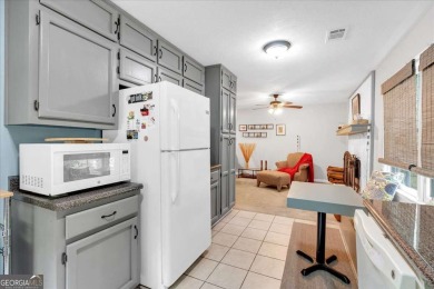 Discover this charming 3-bedroom, 2-bath ranch-style home on Fairfield Plantation Golf and Country Club in Georgia - for sale on GolfHomes.com, golf home, golf lot