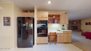 Welcome to this charming and spacious one-story home situated on on Whispering Pines Golf Course in North Carolina - for sale on GolfHomes.com, golf home, golf lot