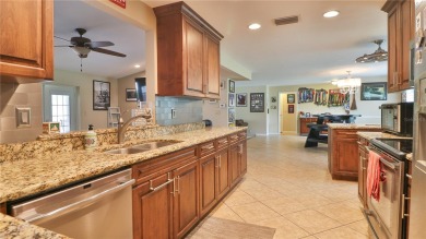 Imagine yourself living in this beautiful pool home in the heart on Bayou Golf Club in Florida - for sale on GolfHomes.com, golf home, golf lot