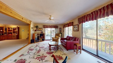 Welcome to this charming and spacious one-story home situated on on Whispering Pines Golf Course in North Carolina - for sale on GolfHomes.com, golf home, golf lot