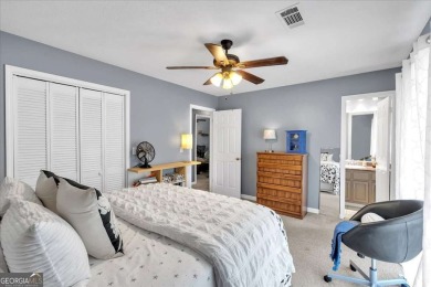 Discover this charming 3-bedroom, 2-bath ranch-style home on Fairfield Plantation Golf and Country Club in Georgia - for sale on GolfHomes.com, golf home, golf lot