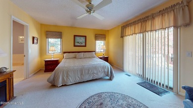 Welcome to this charming and spacious one-story home situated on on Whispering Pines Golf Course in North Carolina - for sale on GolfHomes.com, golf home, golf lot