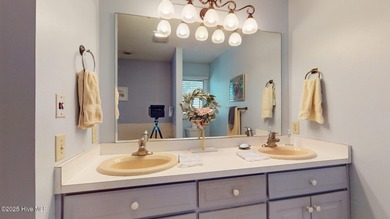 Welcome to this charming and spacious one-story home situated on on Whispering Pines Golf Course in North Carolina - for sale on GolfHomes.com, golf home, golf lot