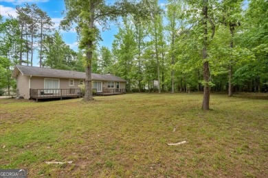 Discover this charming 3-bedroom, 2-bath ranch-style home on Fairfield Plantation Golf and Country Club in Georgia - for sale on GolfHomes.com, golf home, golf lot