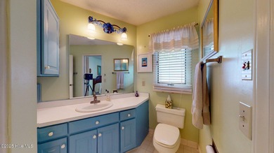 Welcome to this charming and spacious one-story home situated on on Whispering Pines Golf Course in North Carolina - for sale on GolfHomes.com, golf home, golf lot