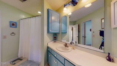 Welcome to this charming and spacious one-story home situated on on Whispering Pines Golf Course in North Carolina - for sale on GolfHomes.com, golf home, golf lot