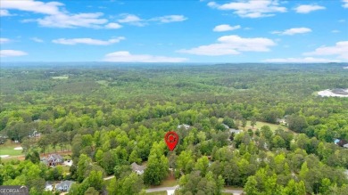 Discover this charming 3-bedroom, 2-bath ranch-style home on Fairfield Plantation Golf and Country Club in Georgia - for sale on GolfHomes.com, golf home, golf lot