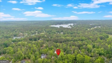 Discover this charming 3-bedroom, 2-bath ranch-style home on Fairfield Plantation Golf and Country Club in Georgia - for sale on GolfHomes.com, golf home, golf lot